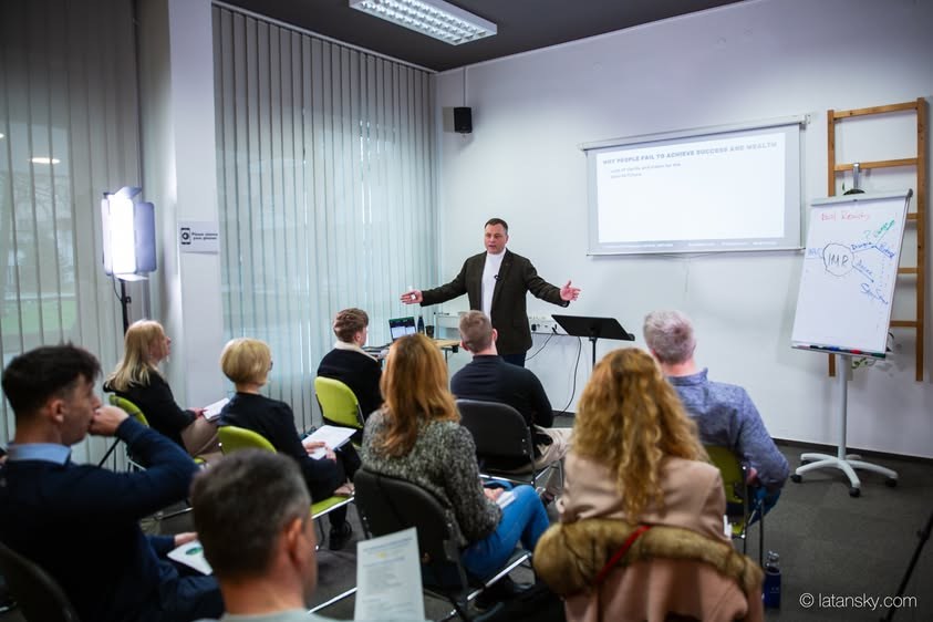 Mykola Latansky addressing a seated audience in Ljubljana